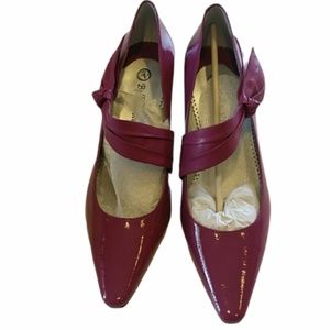 Brand new. Never worn. Bell Vita plum pumps